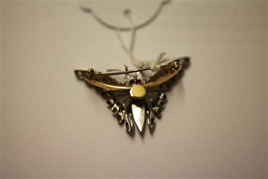 A gold and platinum, rose cut diamond, graduated split pearl and enamel butterfly brooch, 1.5in.
